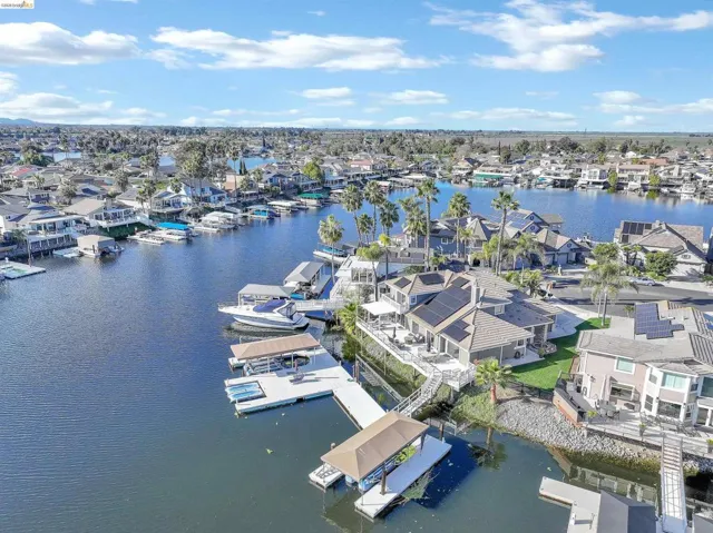 Aerial view of residential area with a nearby body of water