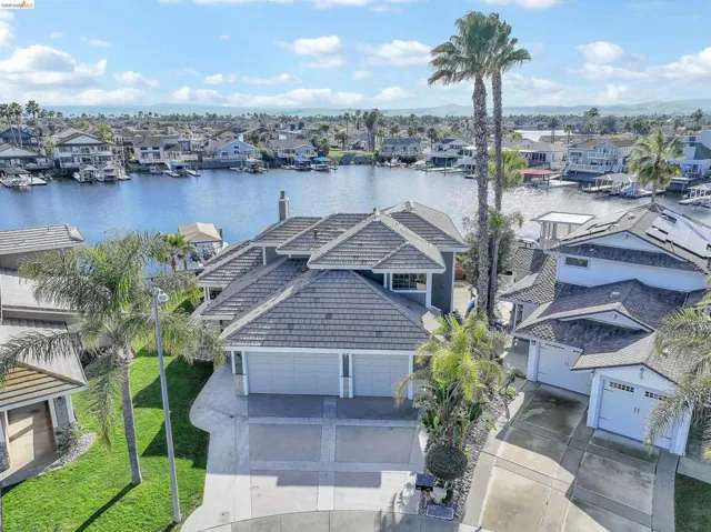 Aerial view of residential area with a large body of water