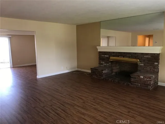 View of living room + entrance to family room