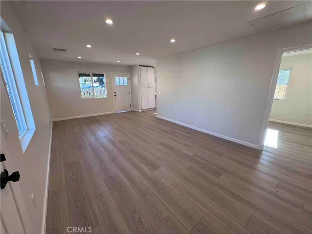 Main - Living/Dining Area facing Corner Kitchen