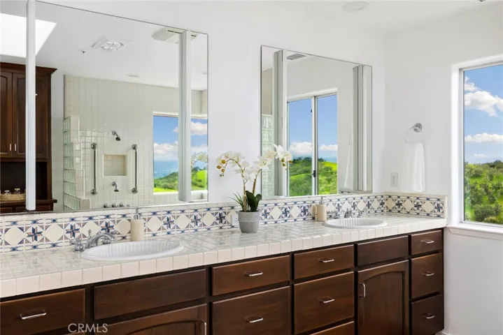 Primary en suite with double sinks.