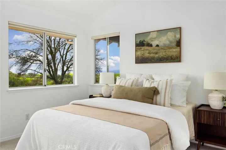 Guest bedroom #2 also has a door leading to the back patio.