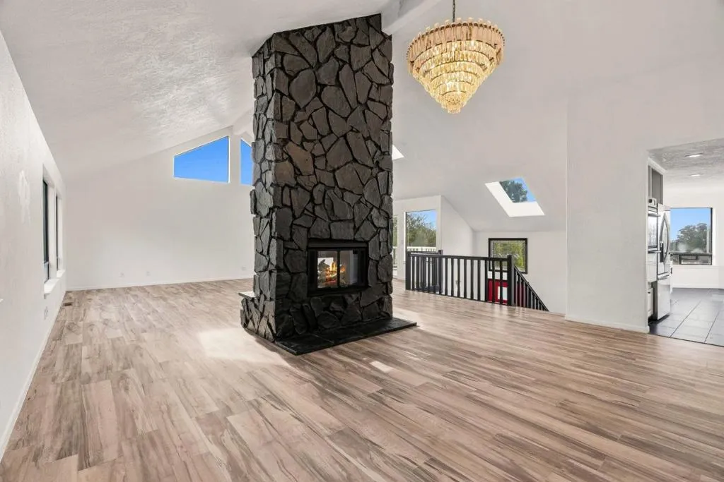 Double Sided Gas Fireplace as viewed from the Dining Room