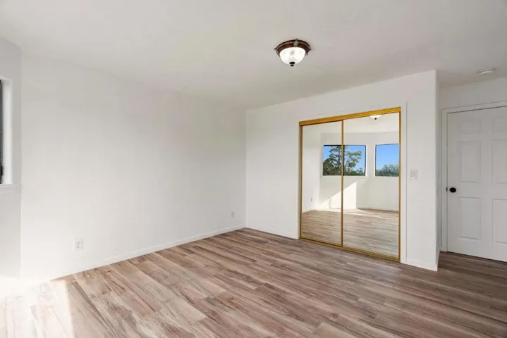 Downstairs Recreation Room (could be bedroom, has slider to the back yard)