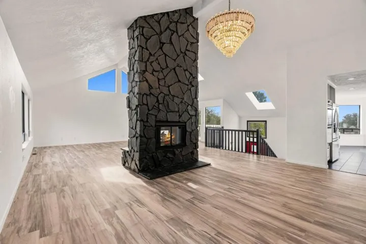 Double Sided Gas Fireplace as viewed from the Dining Room