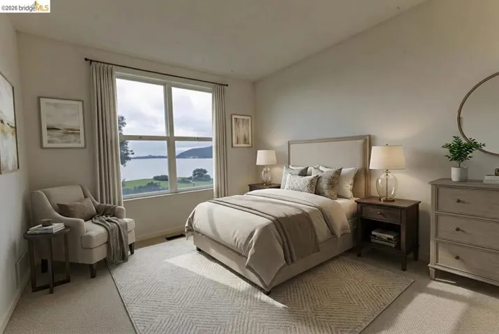 Bedroom featuring carpet flooring and a water view