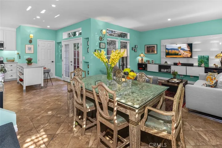 The in-law unit has its own living room, dining room, a kitchen and a half-bathroom downstairs.