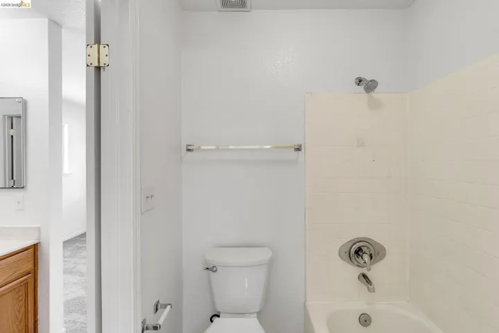 Full bath with  shower combination and vanity