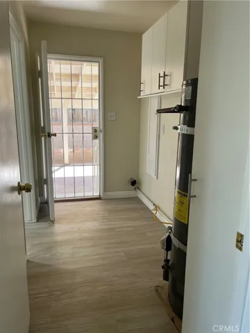 Laundry Area and Back Yard Door Access.