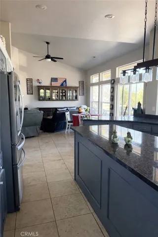 AI enhanced photo to remove items from counter and lighten photo (it removed the cooktop also). OOPPPPS!