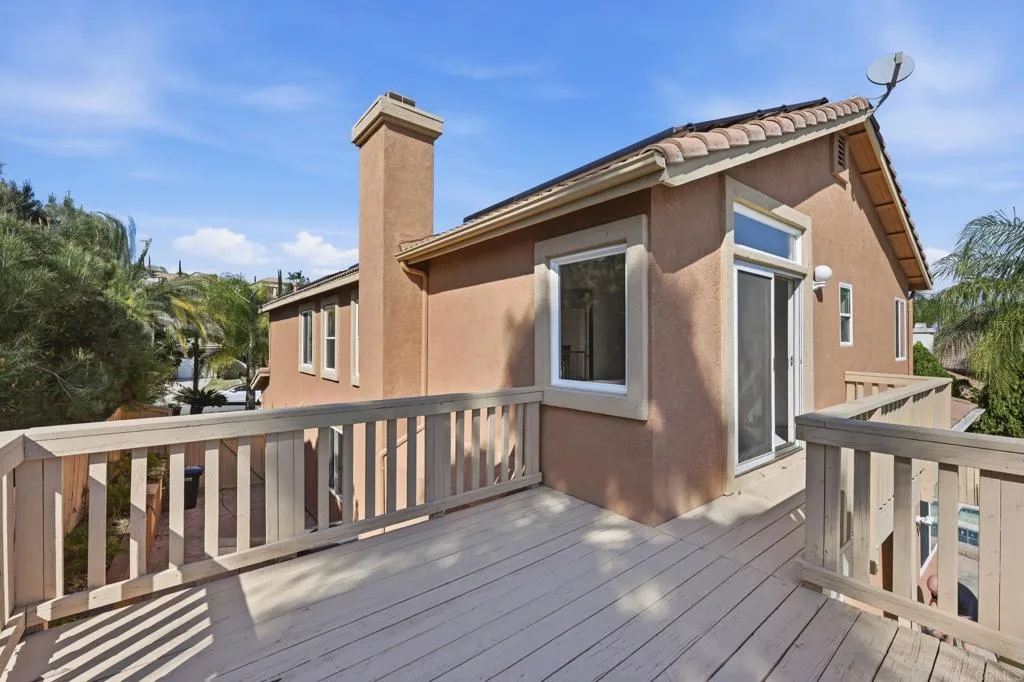 Spacious Deck right outside your view primary bedroom, enjoy your morning coffee or night cap here