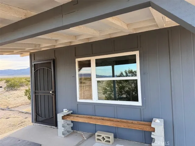 Front porch with a large covered patio.
