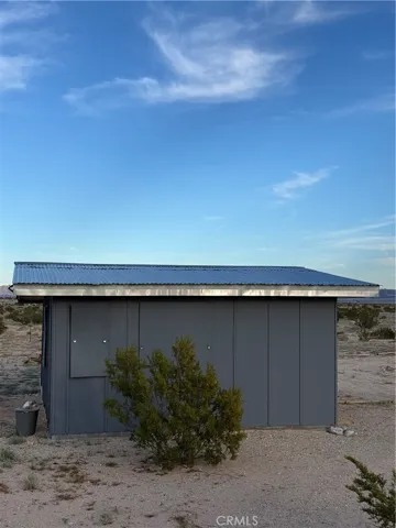 The cabin has a metal roof.