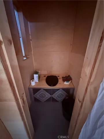 Indoor camp style toilet.