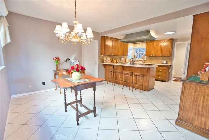 Dining Room and interior door to the direct access garage with laundry hook-ups