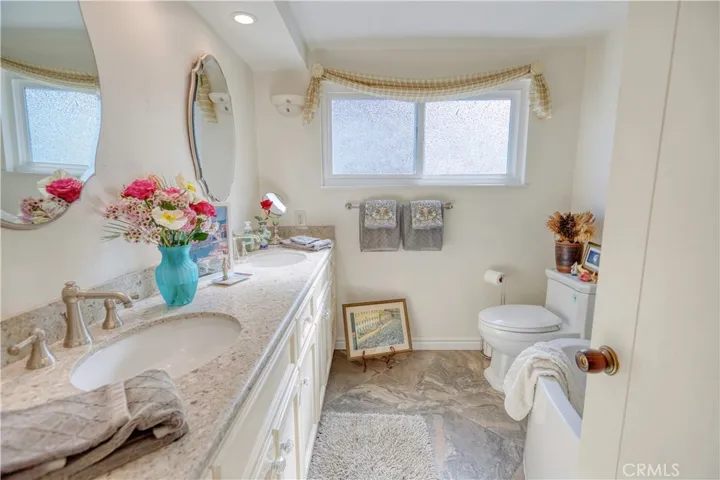  Luxuriously remodeled full bath in the hallway