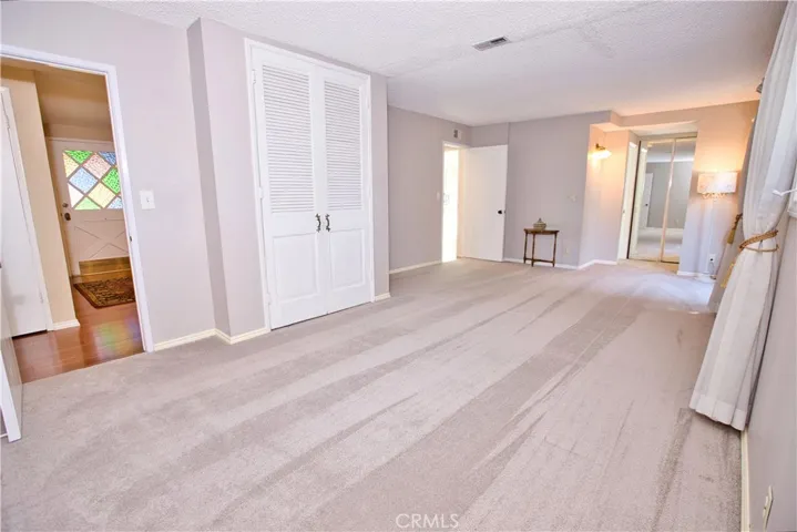 Originally a 4-bedroom home, these rooms were combined to make a large primary suite