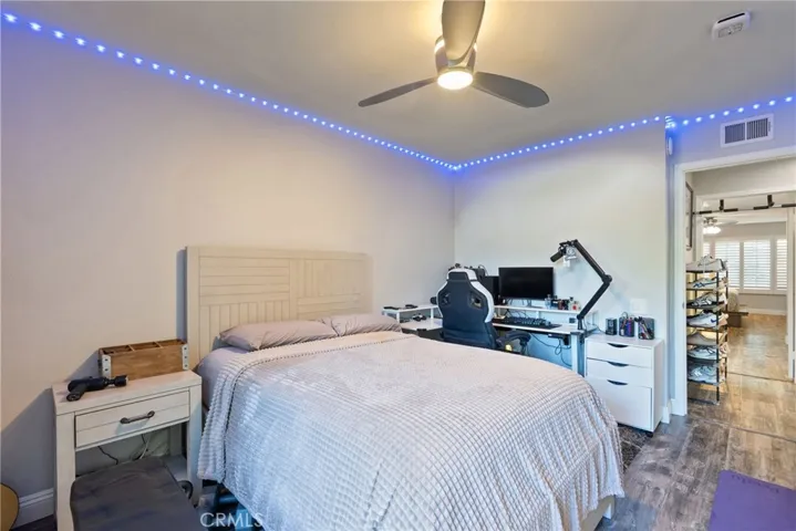 Bedroom 3 with Private Patio & Access to Front Yard