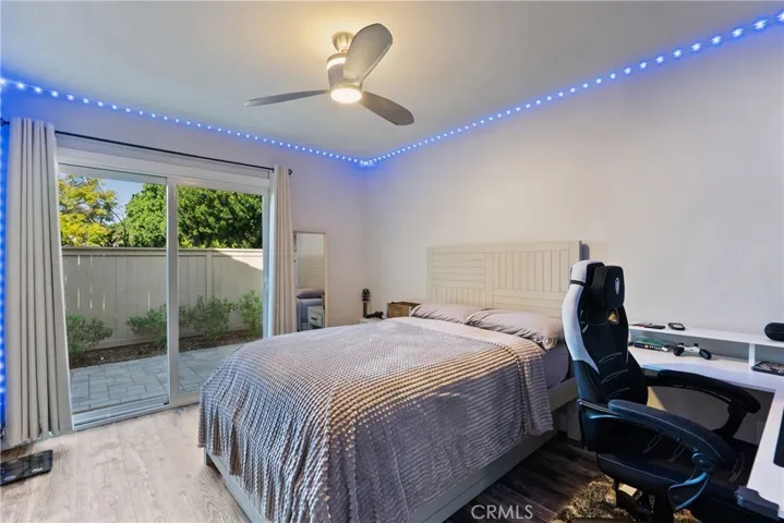 Bedroom 3 with Private Patio & Access to Front Yard