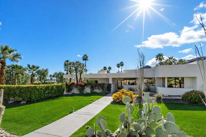 Desert modern home with vibrant landscap