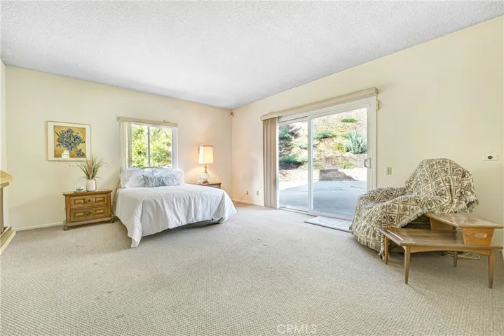 You can drive a vehicle up the side of the property to this lower story bedroom.