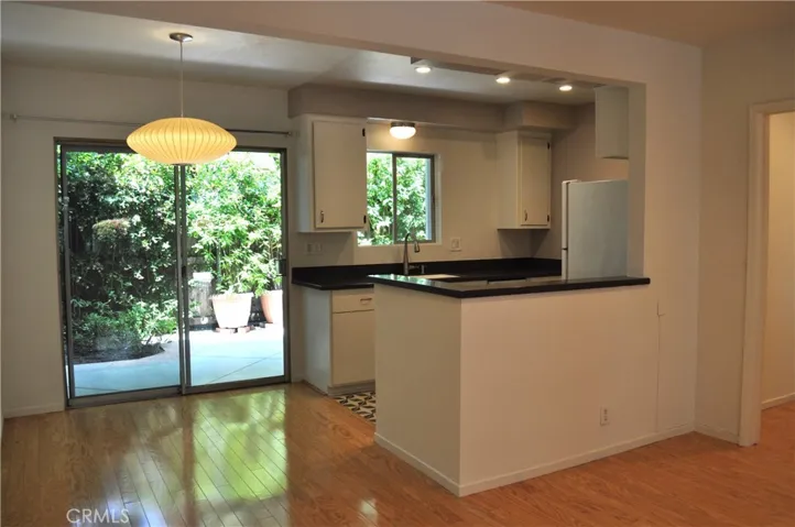 Dining Room sliding doors to outside - kitchen with counter bar for casual eating