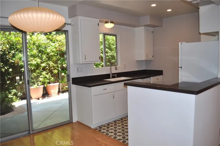 Kitchen with refrigerator, oven, stove and dishwasher