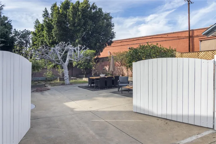 gate next to the garage to enter the back yard.