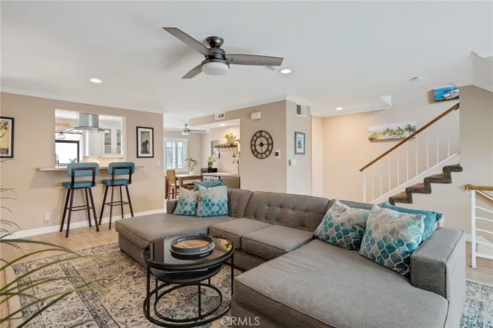 Living room opens to kitchen bar counter