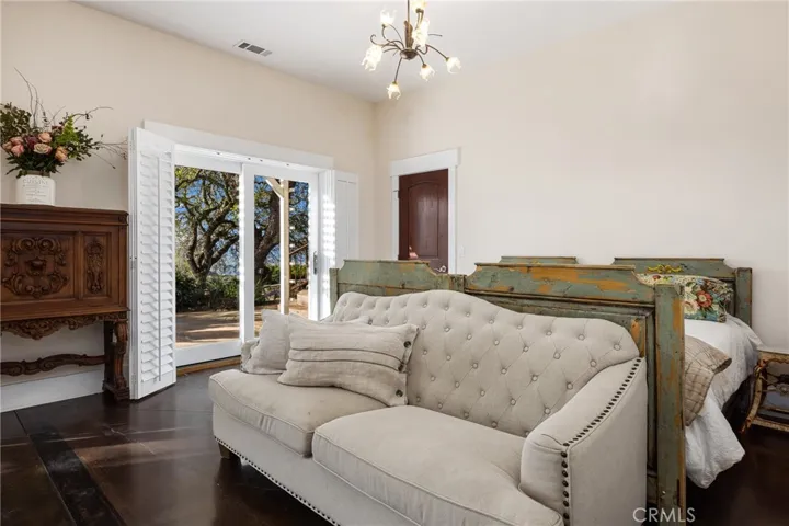 Bedroom 3: Spacious with access to the back area.