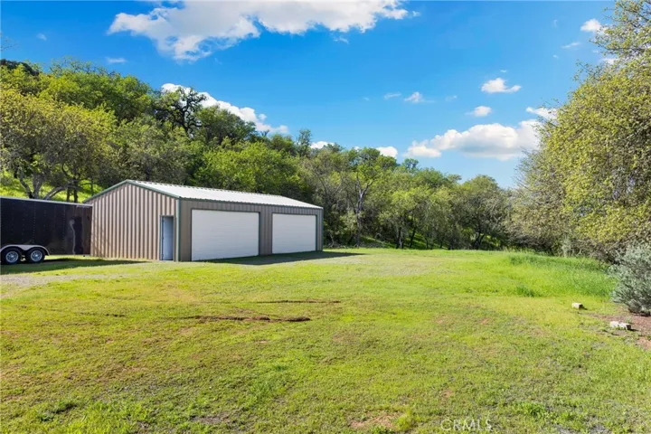 20x40 shop on a nice plateau, usable for your lake toys or convert to a horse barn.
