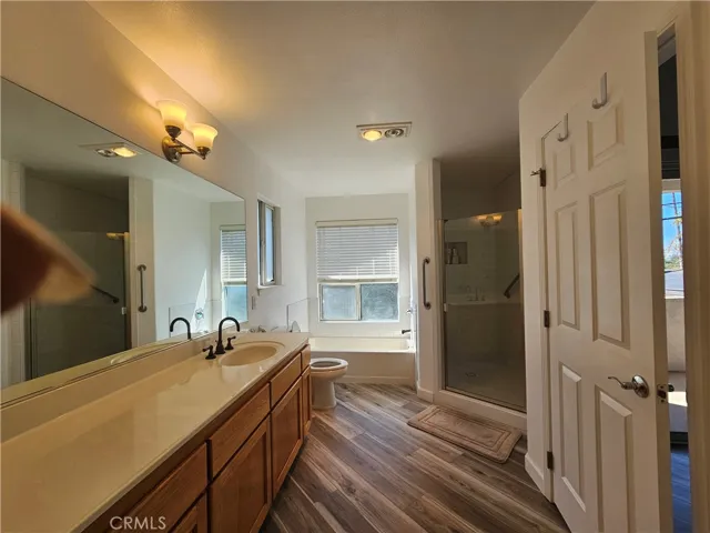 Beautifully updated master bathroom with separate shower, relaxing soaking tub and dual sinks.