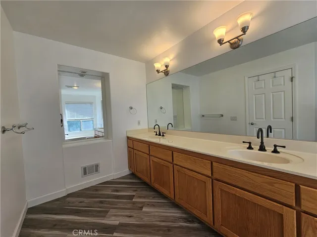 Beautifully updated master bathroom with separate shower, relaxing soaking tub and dual sinks.