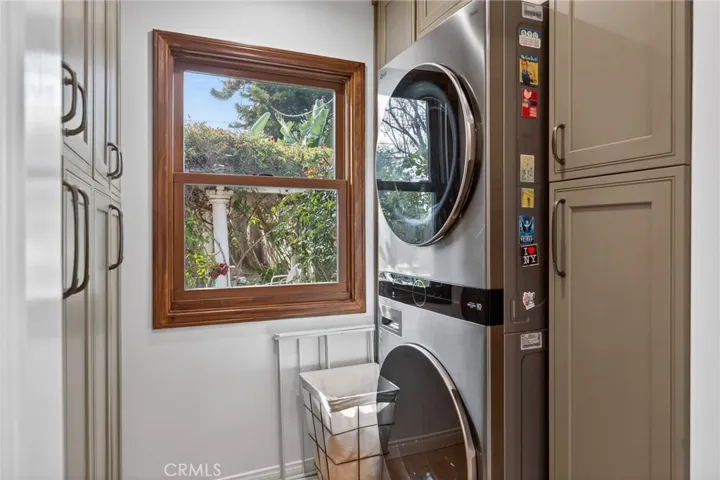 Laundry room off the kitchen - large storage and a window!