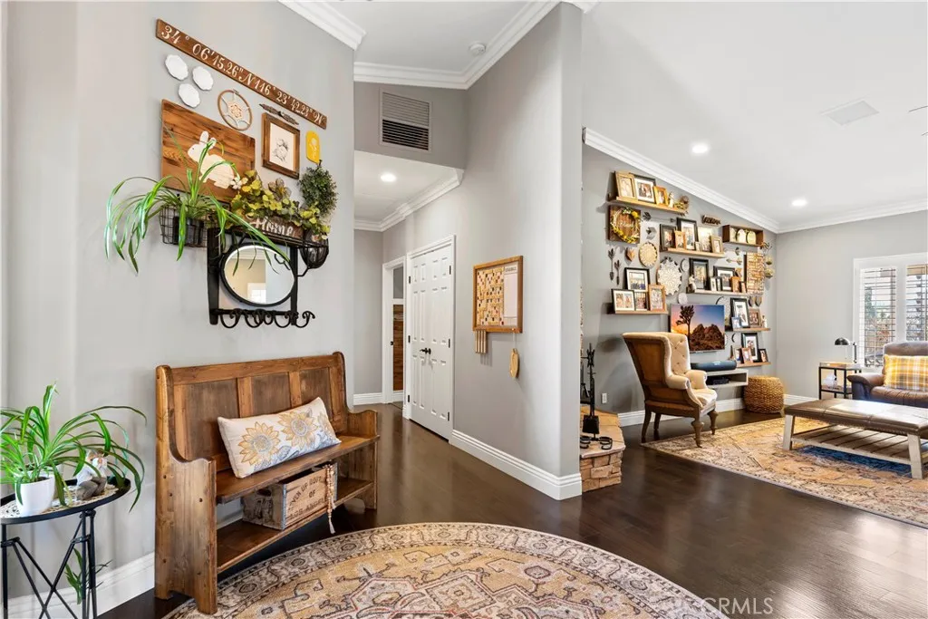 Front entry. Custom gallery wall/shelves.