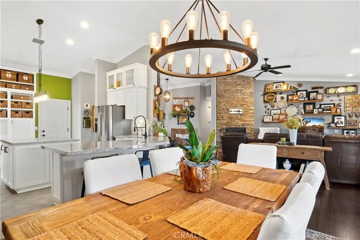 Open concept dining room, kitchen, living room. Dining furniture negotiable