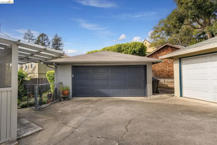 Detached garage with a gate