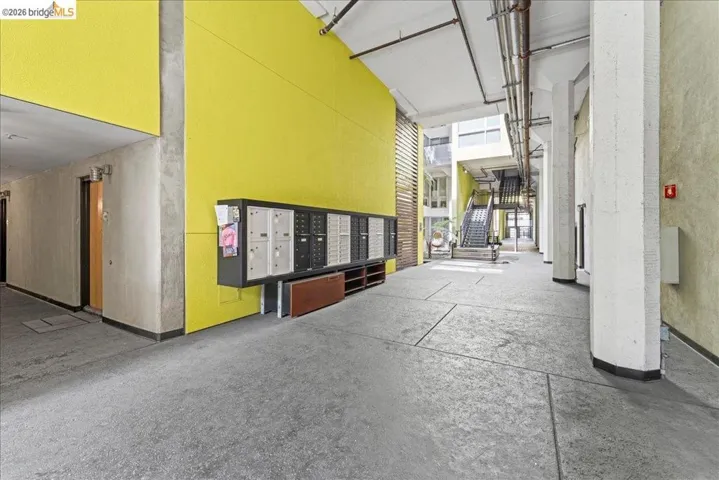 View of property's community with mail area and a patio area