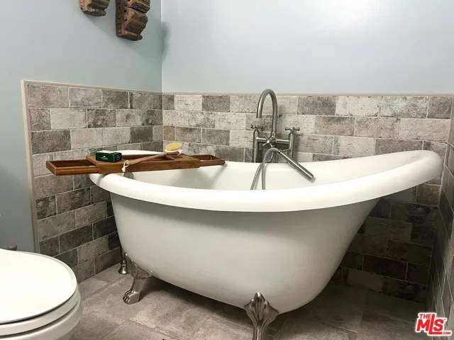 Crowfoot Bathtub and Heated Fl