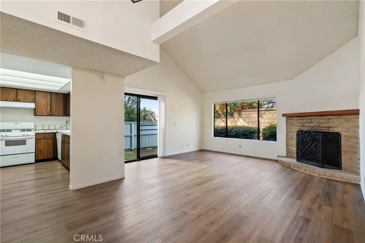Stepping inside you'll appreciate the large windows and sliding glass door that usher in the natural light.