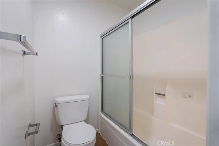 Separate room for the commode and tub/shower combination.