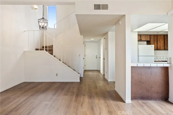 The vaulted ceilings help create a lofty feeling. The dining area is connected to the living area for an easy flow.
