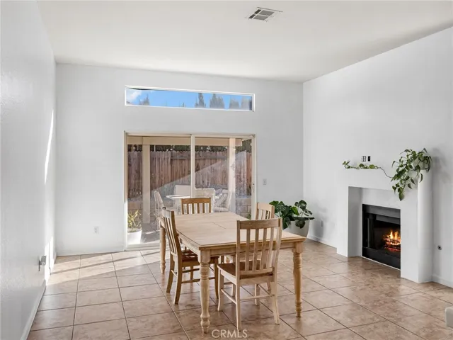 Expansive open-concept design connecting kitchen, dining, and family areas.