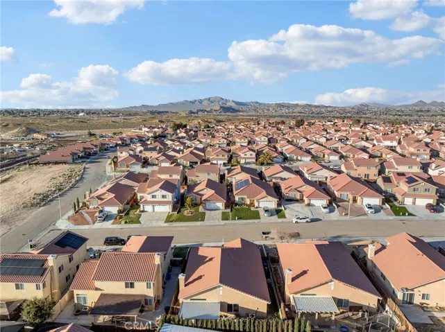 Bird’s-eye view showcasing lot placement and neighborhood layout.