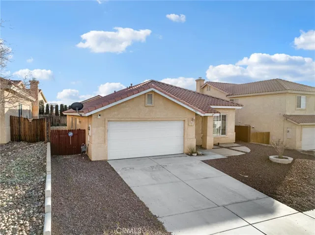 Beautiful single-story home with red tile roof in desirable Lakeview Ridge community.