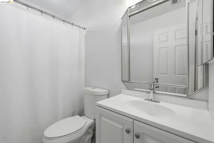 Bathroom with vanity and a shower with curtain