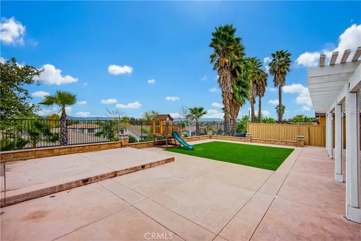 Combination of low-maintenance turf and concrete areas