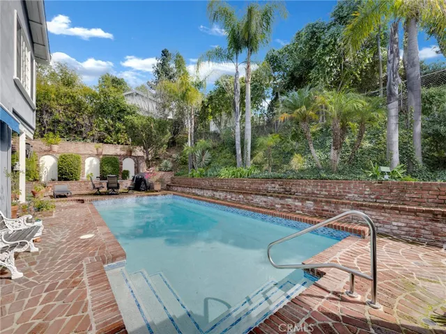 Private side yard, swimmers pool.