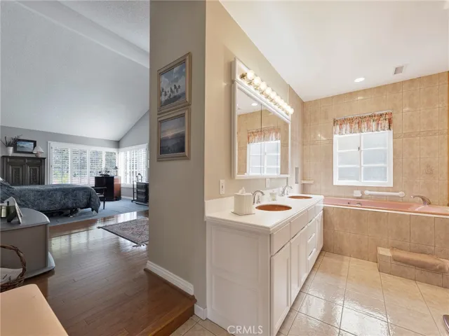 Primary bath,  vanity and jetted tub.