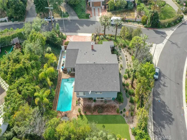 Beautifully landscaped lot with mature trees